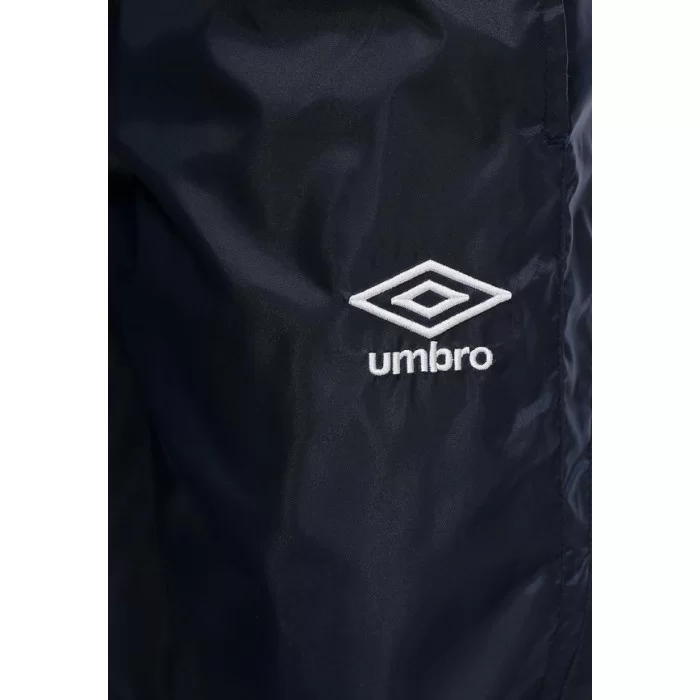 Реальное фото Брюки ветрозащитные Umbro Uniform II Shower Pant  т.син/бел/бел 423014/911 от магазина СпортЕВ