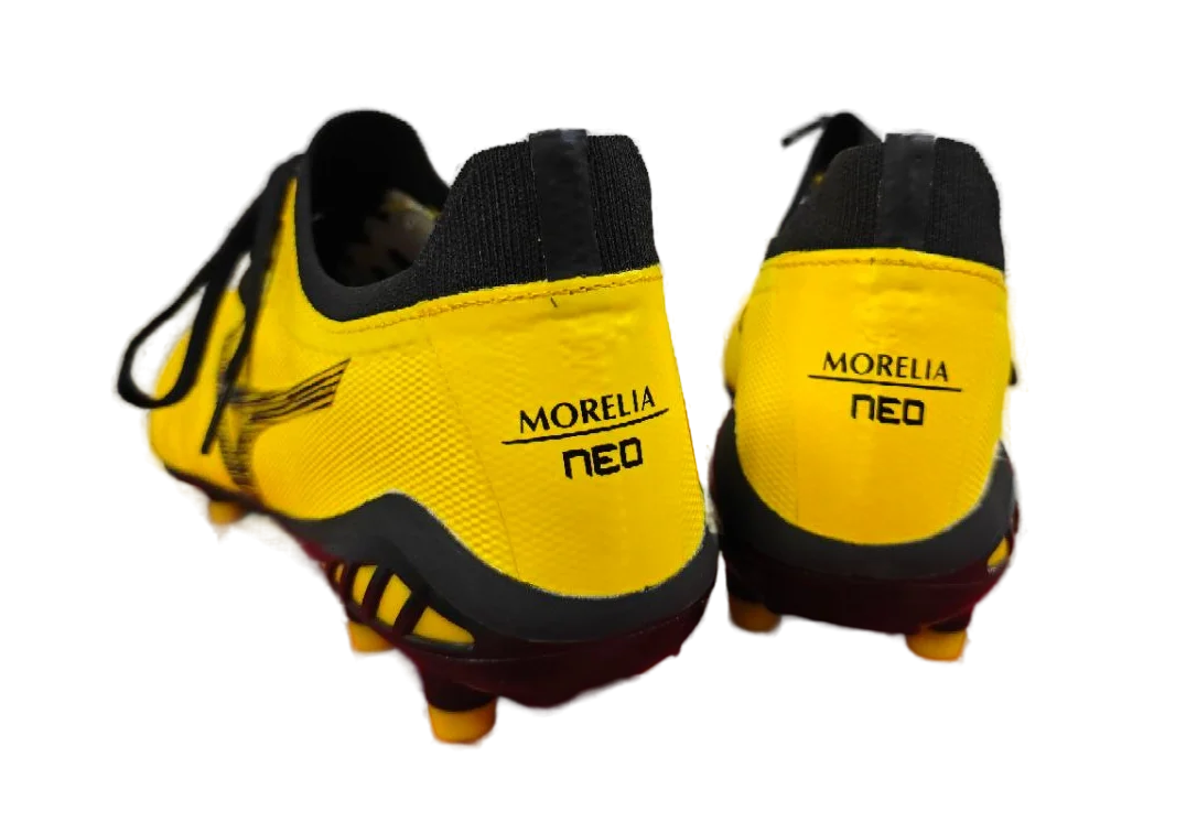 Реальное фото Бутсы Mizuno Morelia Neo AG желтый G0320 от магазина Спортев