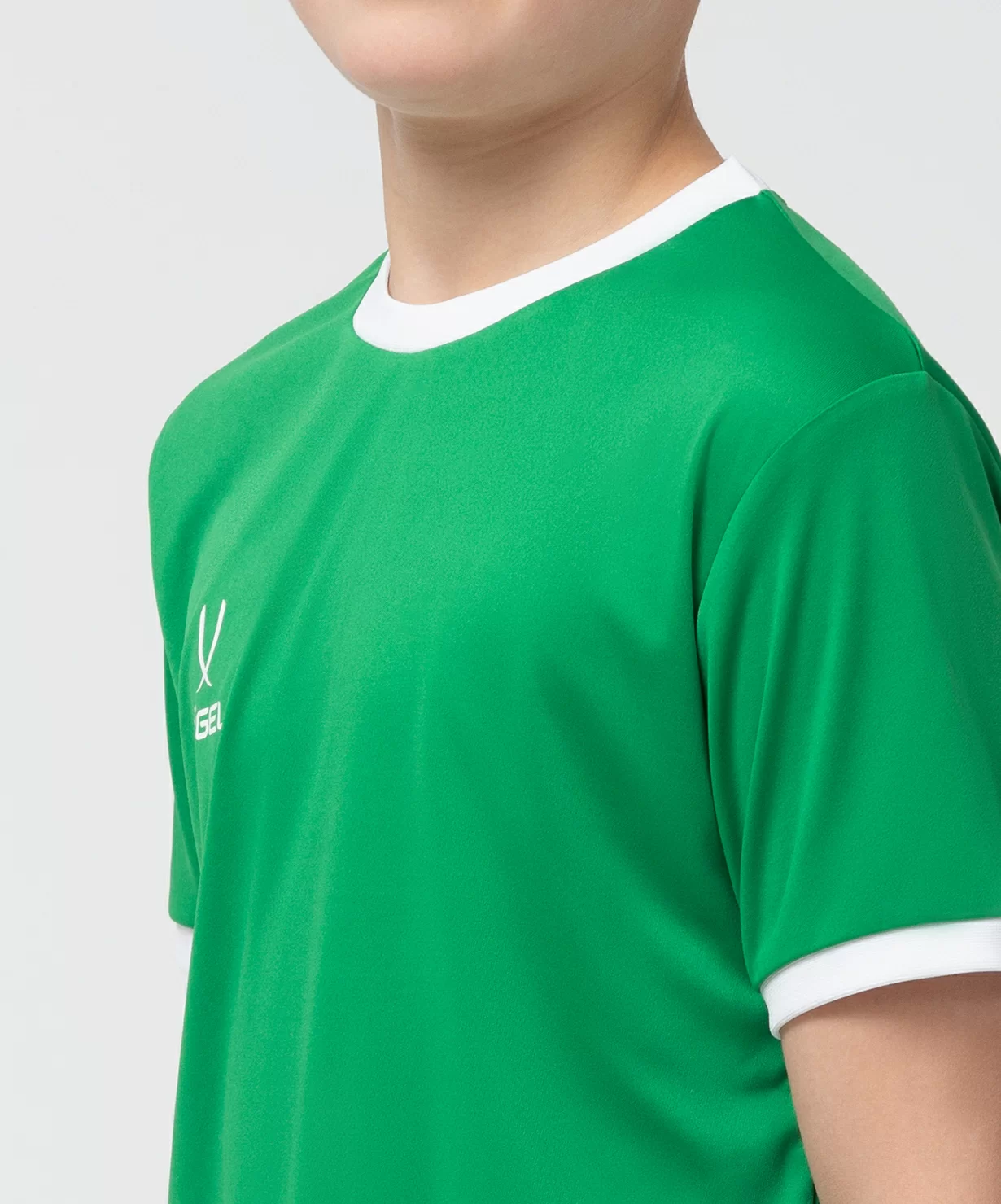 Реальное фото Футболка футбольная CAMP Origin, зеленый/белый, детский Jögel от магазина Спортев