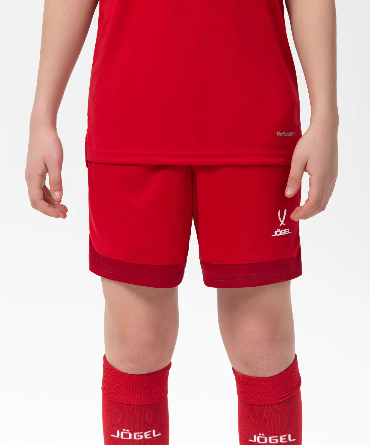 Реальное фото Шорты игровые DIVISION PerFormDRY Union Shorts, красный/ темно-красный/белый, детский Jögel от магазина Спортев