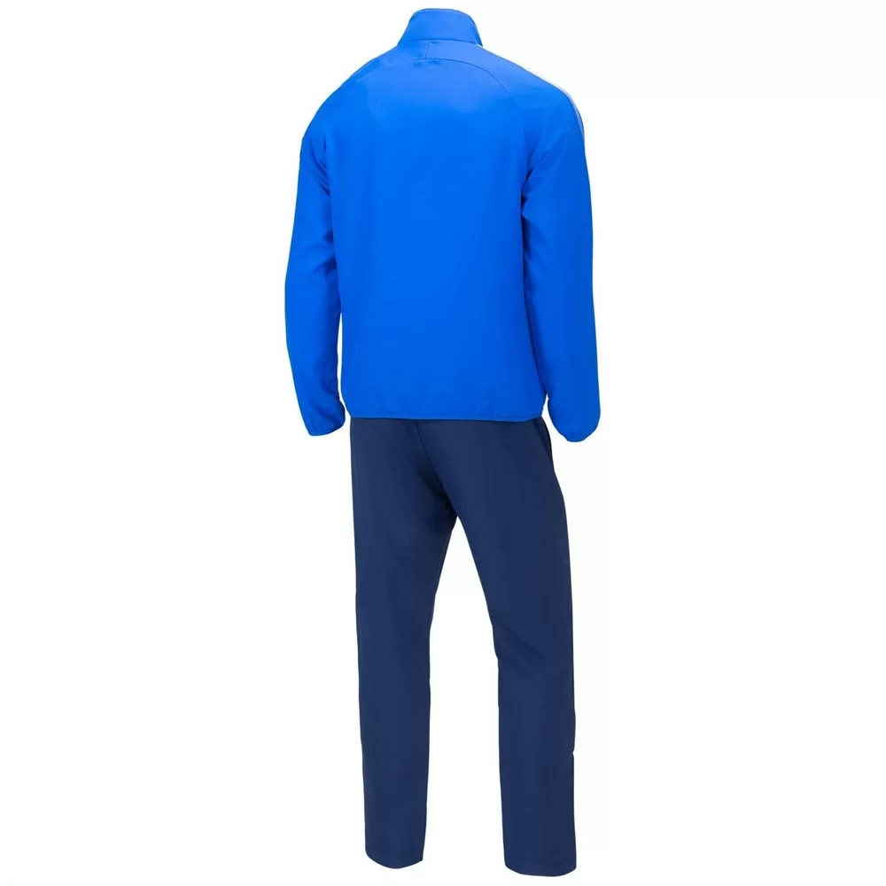 Реальное фото Костюм спортивный Jogel Camp Lined Suit синий/темно-синий 18312 от магазина СпортЕВ
