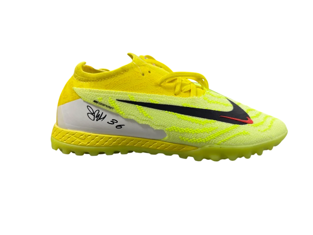 Реальное фото Бутсы Nike Phantom GX Elite turf зеленый/лимон от магазина Спортев