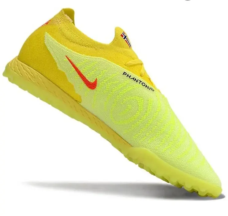 Реальное фото Бутсы Nike Phantom GX Elite turf зеленый/лимон от магазина Спортев