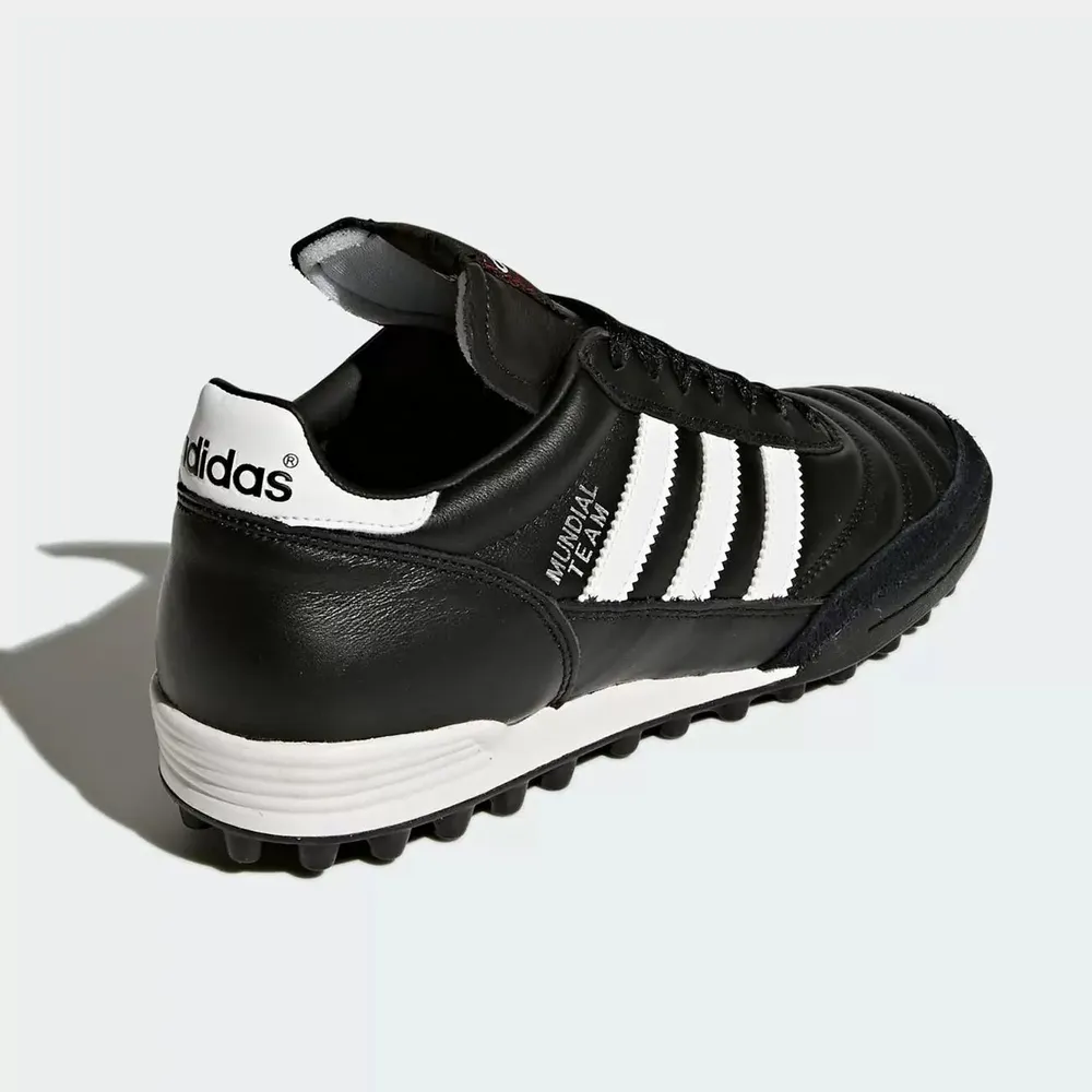 Реальное фото Бутсы Adidas Mundial Team TF New 019228 от магазина Спортев