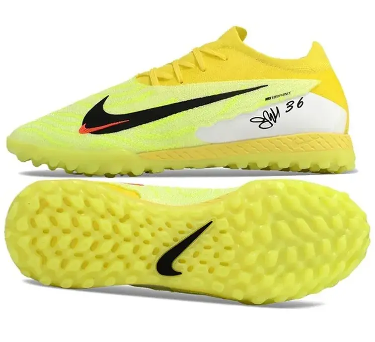 Реальное фото Бутсы Nike Phantom GX Elite turf зеленый/лимон от магазина Спортев